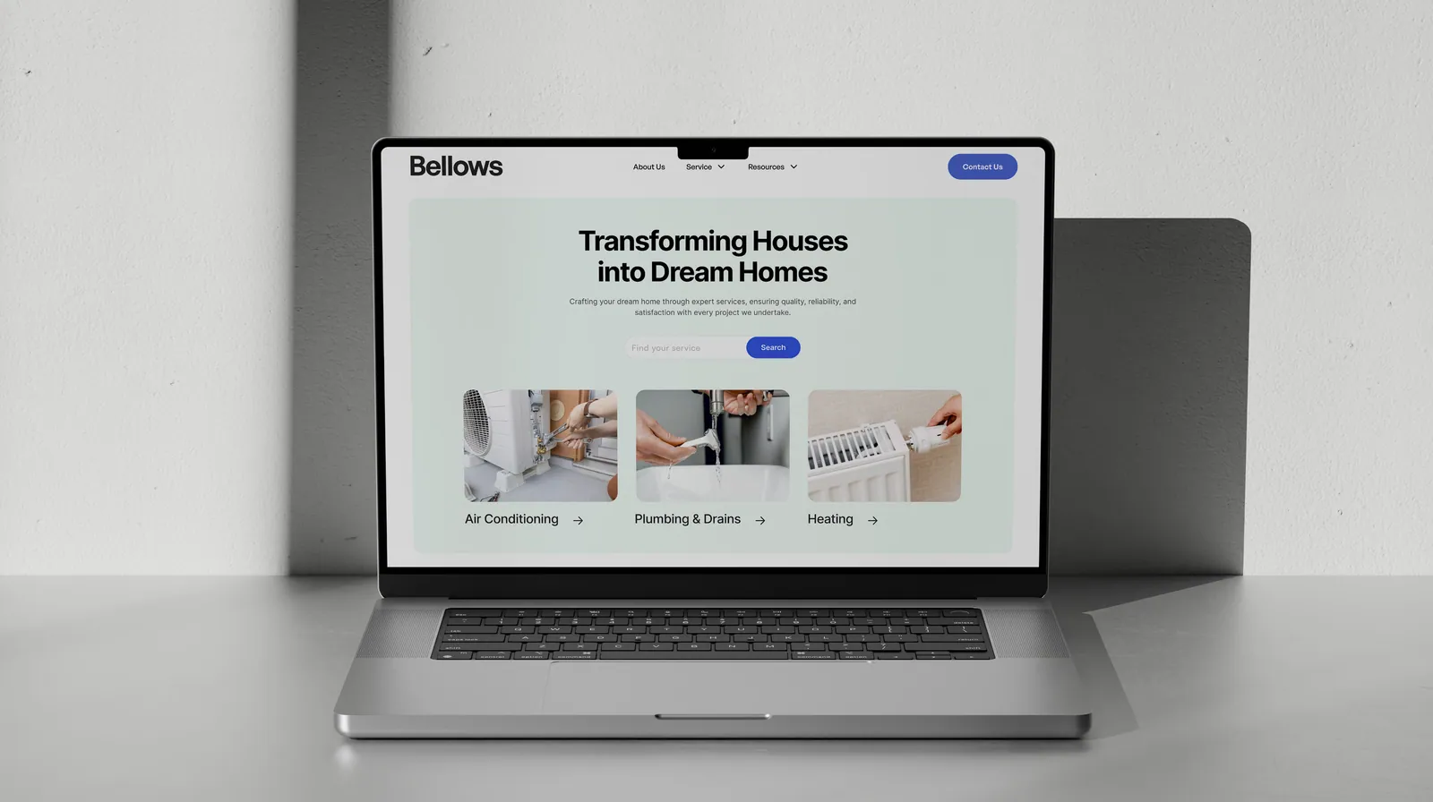 Bellows home services website displayed on a laptop